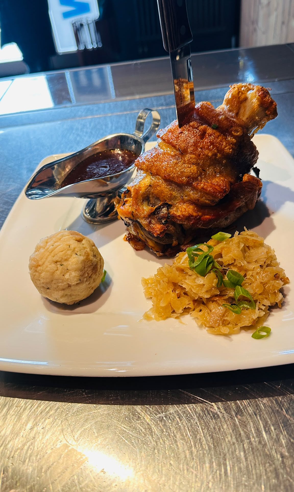 Crispy Schweinshaxe over 1 kg with bread dumpling and sauerkraut